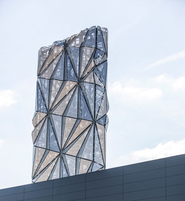 Conrad Shawcross forays into architecture with faceted tower that "defies definition"
