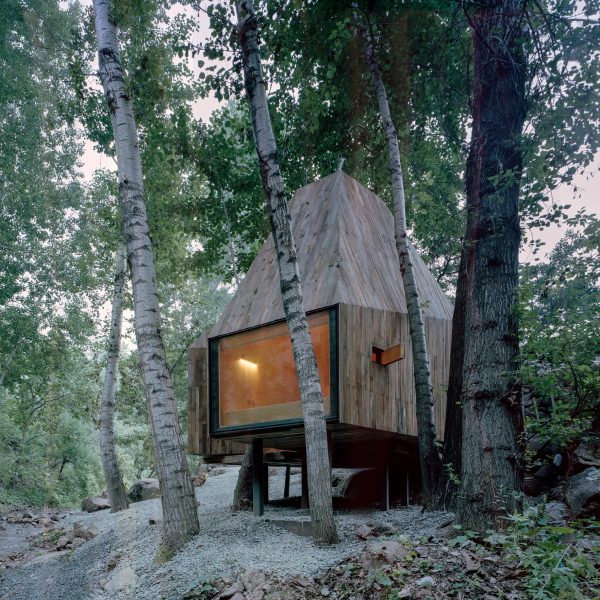 Wee Studio completes crowdfunded treehouses on the edge of a stream in Beijing