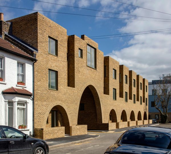Peter Barber includes "cosy" arched entrances at east-London housing scheme
