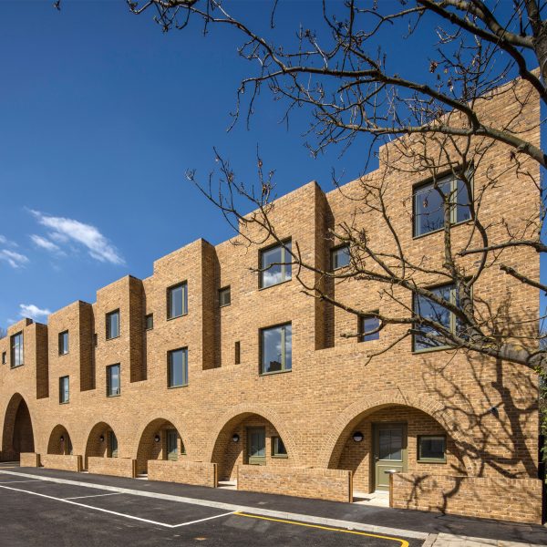 Peter Barber includes "cosy" arched entrances at east-London housing scheme