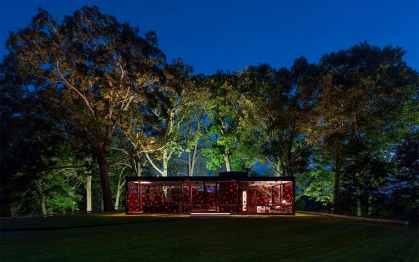 Yayoi Kusama plasters red dots across Philip Johnson's Glass House