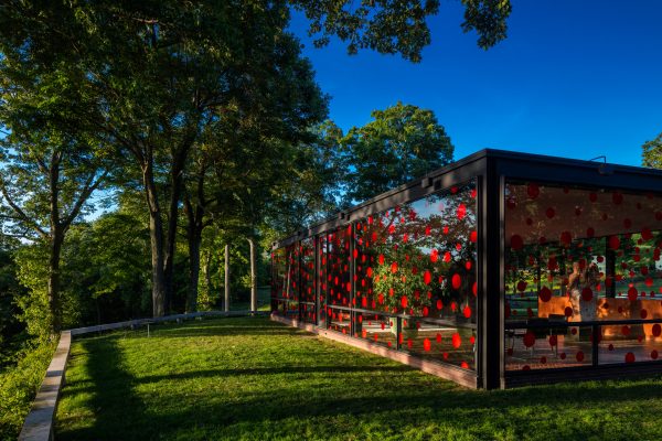 Yayoi Kusama plasters red dots across Philip Johnson's Glass House
