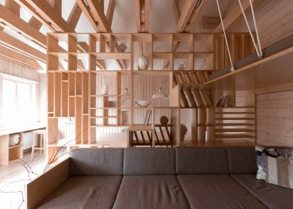 Artist's studio with large plywood partition