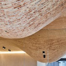 Brick bulges embellish ceiling of Fucina restaurant by Andy Martin Architects