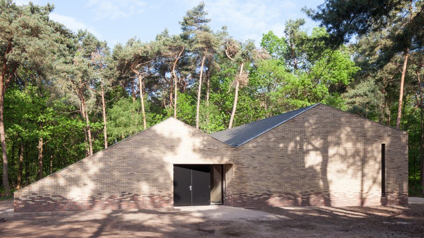 Angular brick theatre by Reset Architecture sits in a woodland clearing