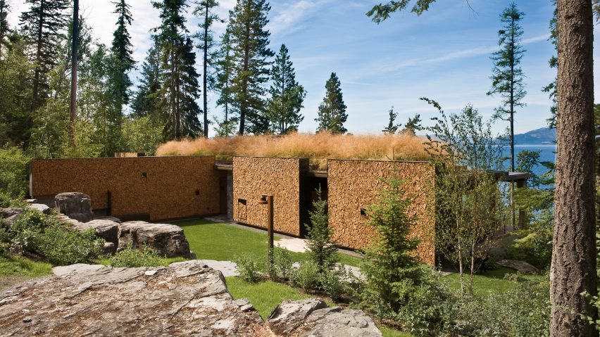 Andersson-Wise creates Montana cabin with cordwood walls and green roof
