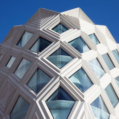 Diamond-shaped latticework covers Victoria Gate shopping centre by Acme