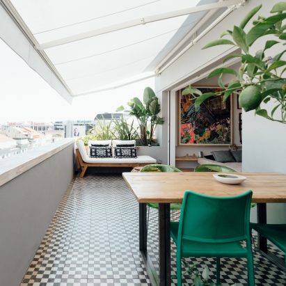 Atelier Data uses light and greenery to transform Lisbon penthouse into urban oasis
