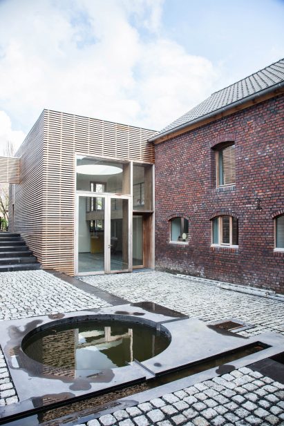 Dutch farmhouse conversion by Jeanne Dekkers Architects in Limburg