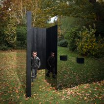 Scott Kyson combines charred timber with smoked glass for garden pavilion