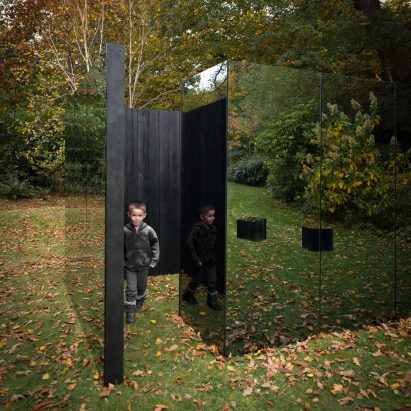 Scott Kyson combines charred timber with smoked glass for garden pavilion