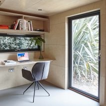 Prefabricated garden studio in south London is clad in cedar and lined in birch