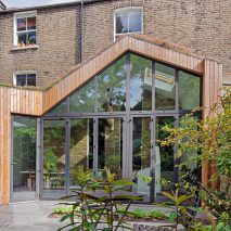 Scenario Architecture covers London house extension in larch and sedum