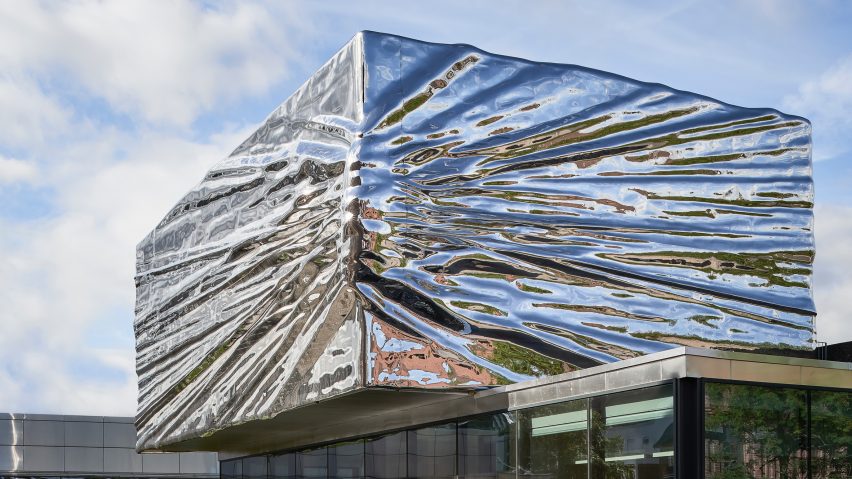 Snøhetta adds crinkled stainless-steel extension to 1960s museum in Norway