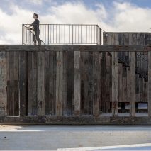 Rugged oak and stone walls enclose holiday home overlooking Chilean wetlands