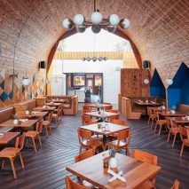 Cedar-clad ceiling arches over San Diego restaurant by Archisects