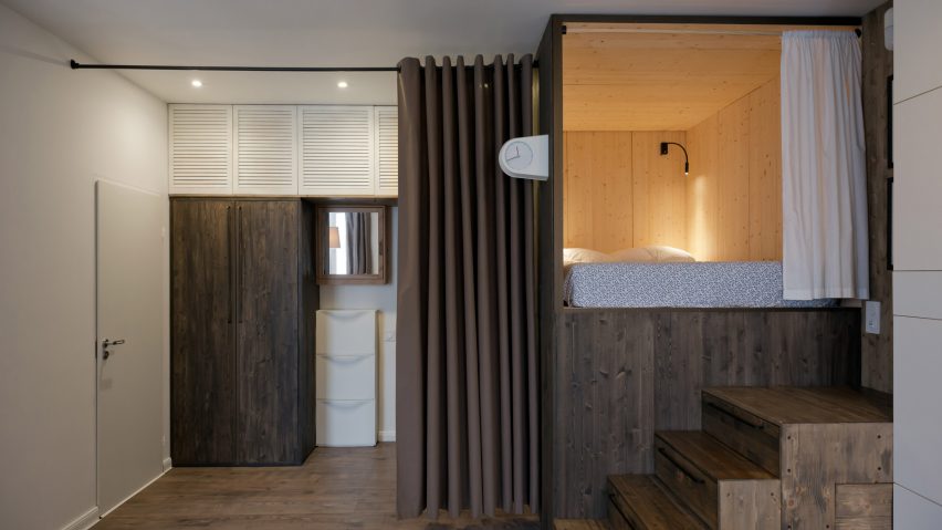 Studio Bazi’s tiny self-designed home features a wooden “sleeping box”