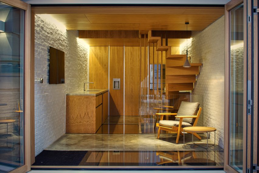 Coffey Architects references Japanese tea houses in renovated London mews home