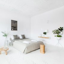 Projekt Praga transforms historic brewery in Poland into minimal apartments
