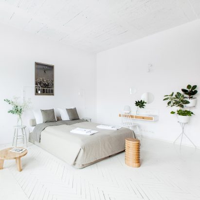 Projekt Praga transforms historic brewery in Poland into minimal apartments