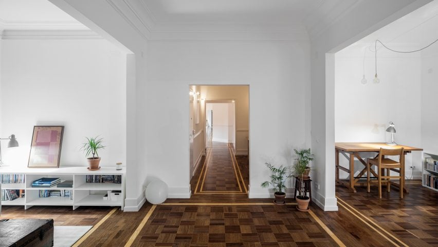 Aboim Inglez Arquitectos overhauls 1930s apartment in Lisbon with wooden parquet and grey marble