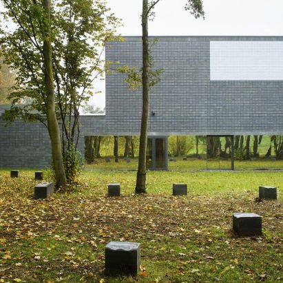 Koen van Velsen Architects uses green-grey brickwork for sports centre near Rotterdam