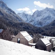 Slovenian holiday home by Prima features glass, larch and aluminium walls