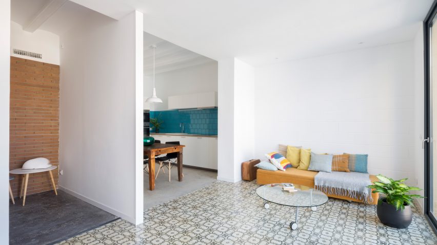 Patterned tiles define rooms in Barcelona bed and breakfast by Nook Architects