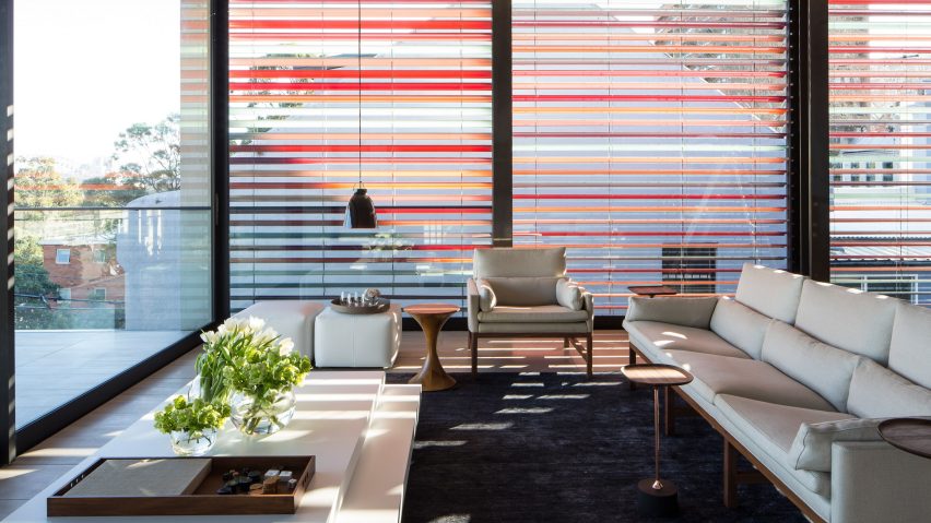 Multi-coloured sunscreens create stripy exterior for Sydney house by Smart Design Studio
