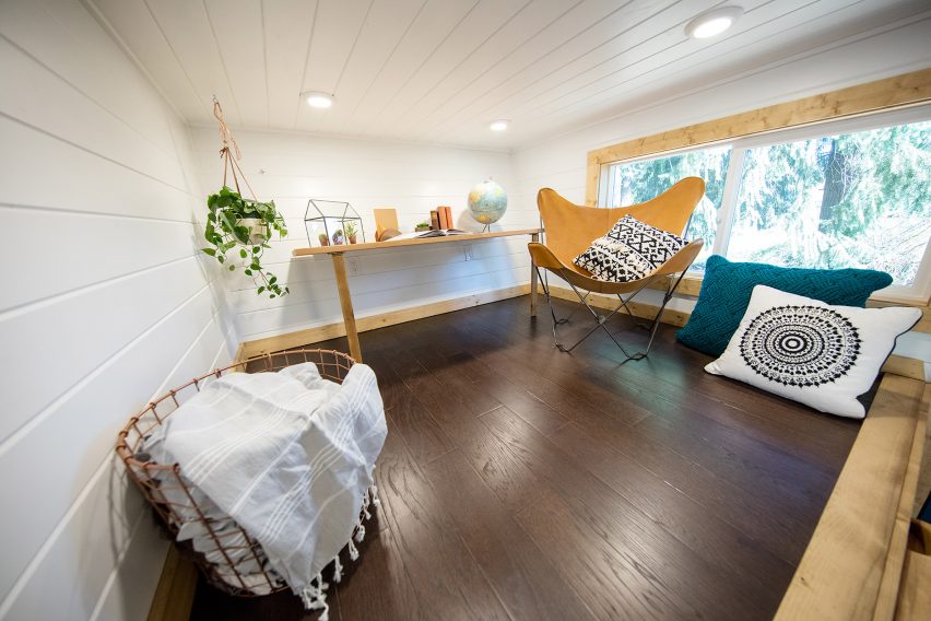 Cabin with climbing wall by Tiny Heirloom