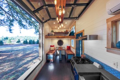 Cabin with climbing wall by Tiny Heirloom