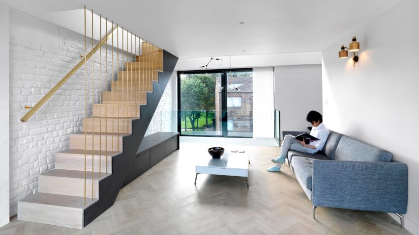 Threefold Architects adds staggered floors and narrow stairwell to London terrace