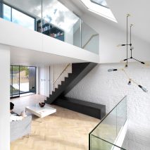 Threefold Architects adds staggered floors and narrow stairwell to London terrace