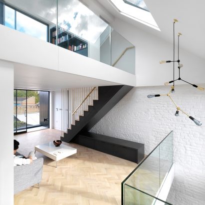 Threefold Architects adds staggered floors and narrow stairwell to London terrace