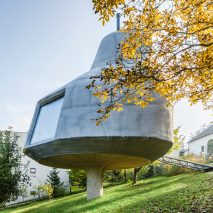 Sprayed polyurethane lends rocky appearance to orchard house by Šépka Architekti