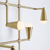 Lightmaker Studio presents geometric brass lighting at IDS Toronto