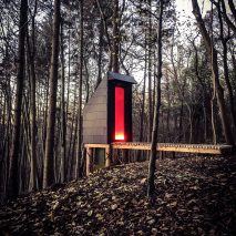 Invisible Studio designs composting toilet for its own woodland workshop