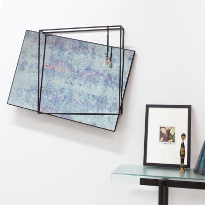 Meike Harde’s mirrors sit askew in frames that double as hangers