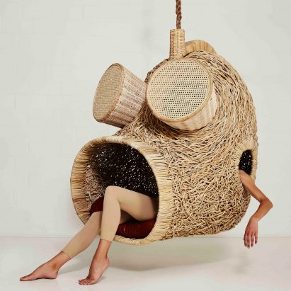 Porky Hefer exhibits human-sized nests made from woven plant stalks
