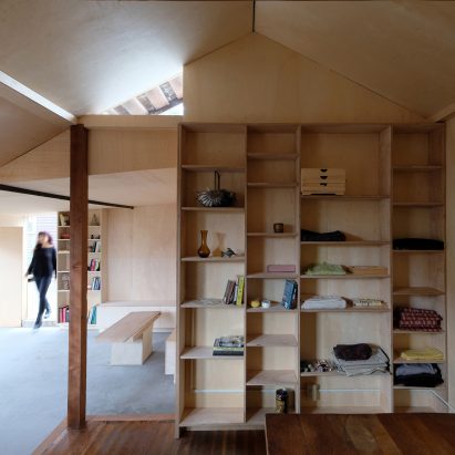 ArcHive turns Californian carriage house into plywood-lined sewing studio