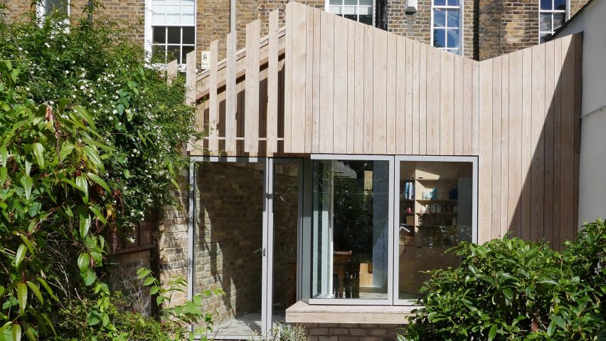 Pamphilon Architects’ larch-clad extension echoes butterfly roof of east London terrace