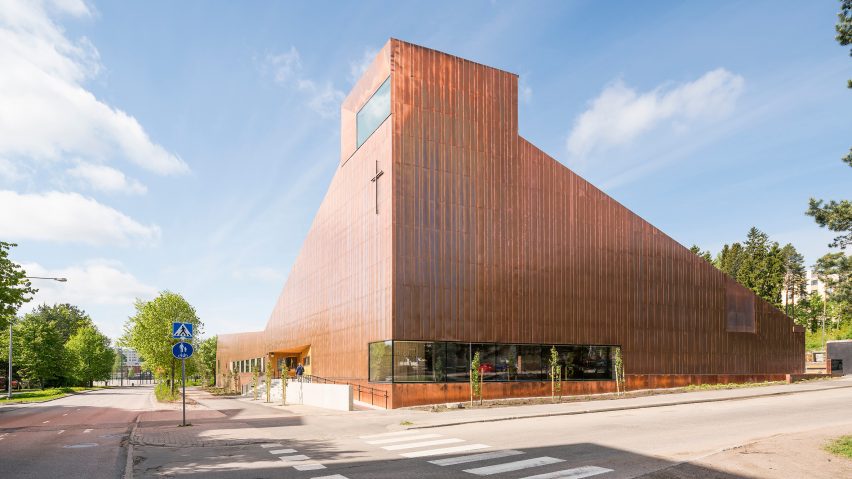 Copper covers walls and roof of Finnish chapel by OOPEAA