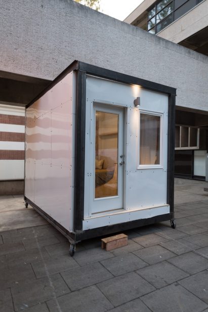 Home for Hope - boxed, metal house with wheels, glass door, window and light