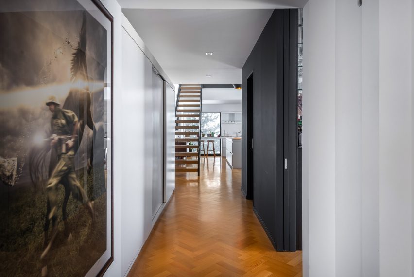 Peart/Weisgerber Residence at Habitat 67 by Moshe Safdie renovated by EMarchitecture First Floor Hall leading to Staircase
