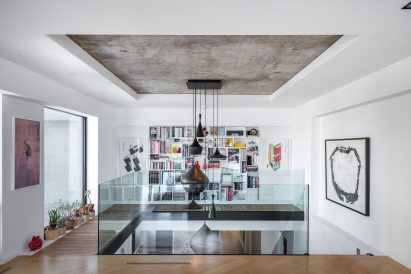 Peart/Weisgerber Residence at Habitat 67 by Moshe Safdie renovated by EMarchitecture Interior View of Stairwell from Second Floor