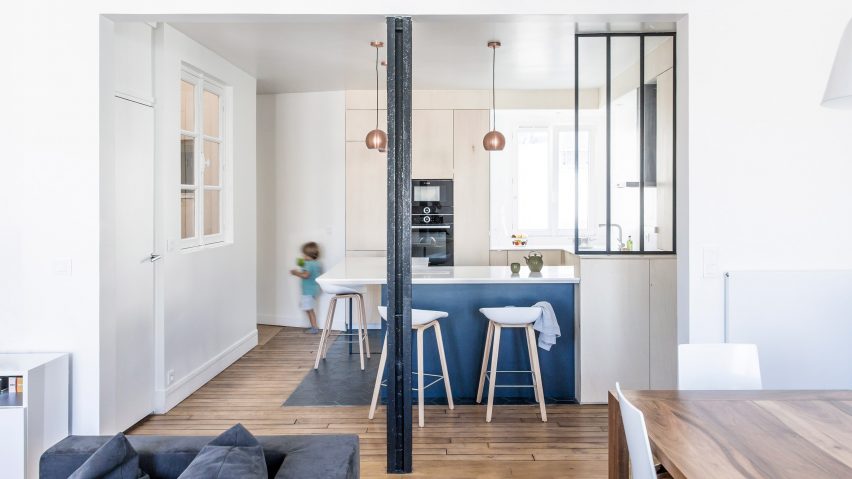 Anne-Laure Dubois uses dark blue tiles and poplar plywood to update Paris apartment