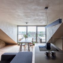 Smoked oak and rustic clay line walls of Japanese-styled apartment by Simon Astridge in London