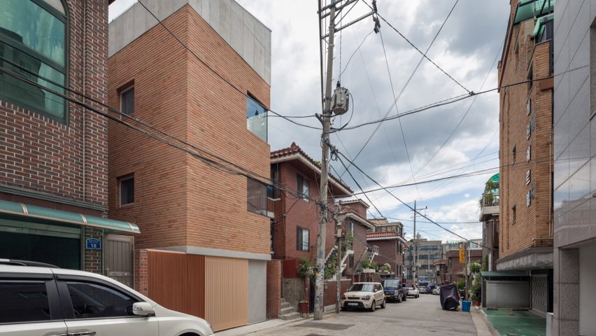 FHHH Friends arranges flexible rooms over split levels in slender Seoul house