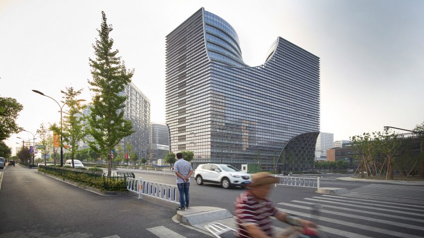 Arched chasms extend through Hangzhou office block by Julien De Smedt