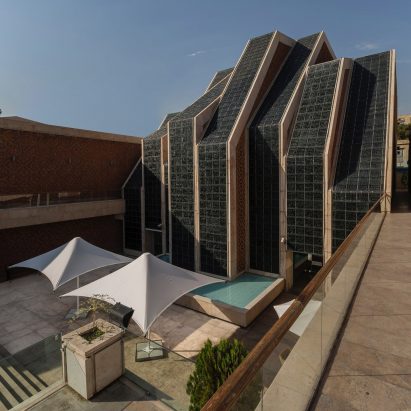 Cultural and religious complex in Iran features roof shaped like interlocking fingers